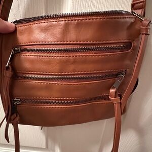 Band new side purse or crossbody bags.